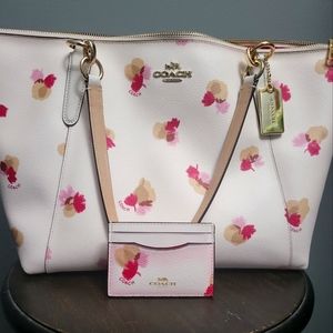 Coach purse with matching card carrier.